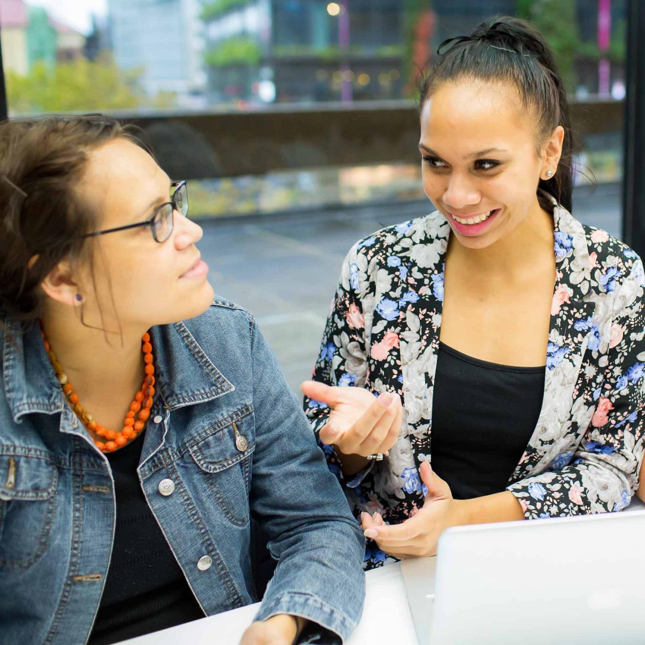 Two women in discussion