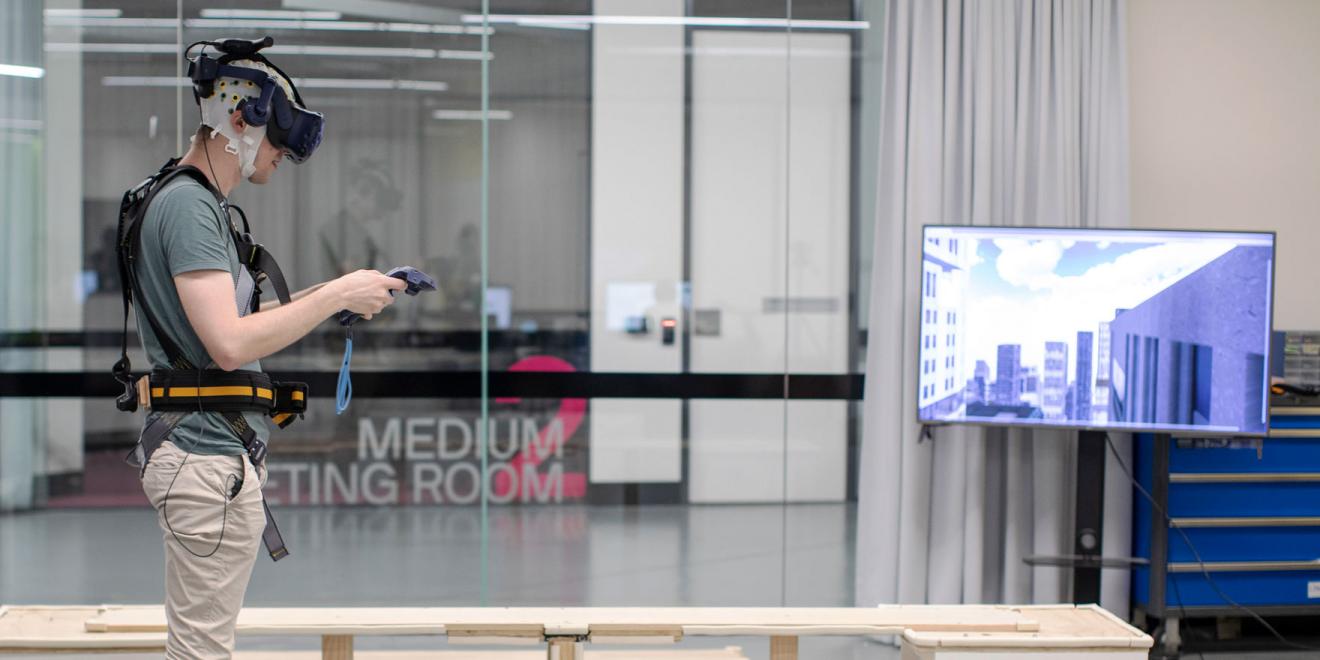A man tests motion simulation and virtual reality