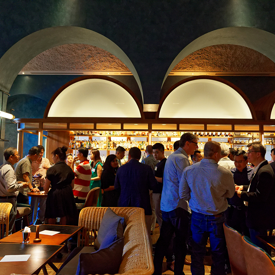 Crowd mingling at the Singapore networking event