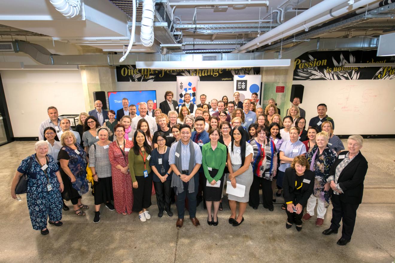 Group photo of the attendees of the 2019 staff giving afternoon tea