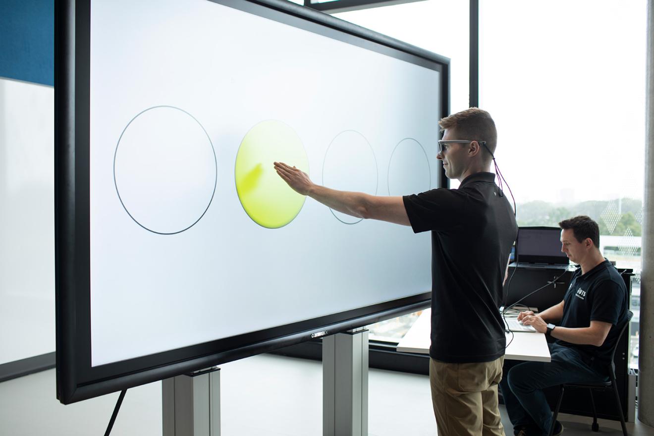 Man touching a touch screen