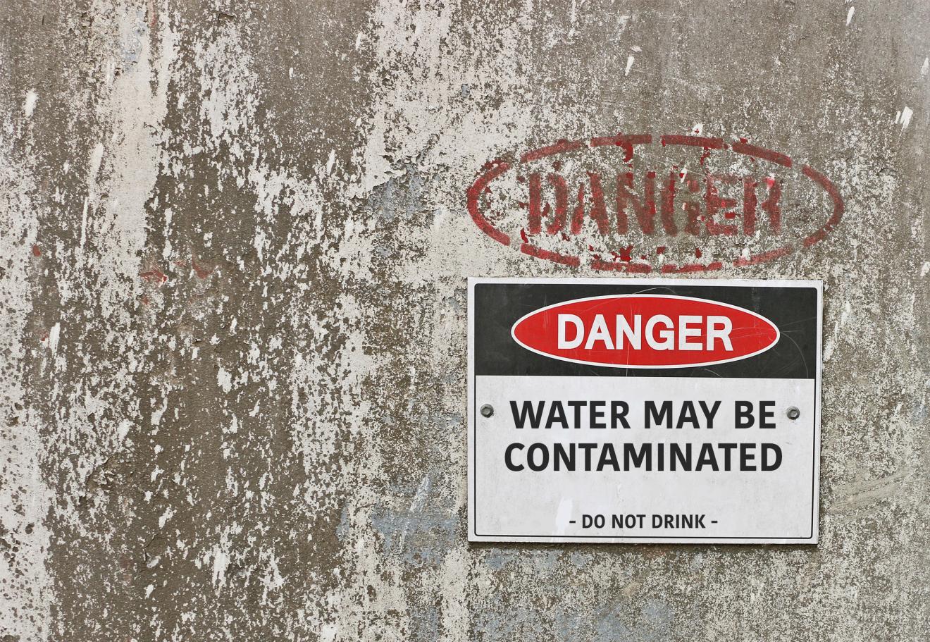 Sign saying "Danger: Water may be contaminated"