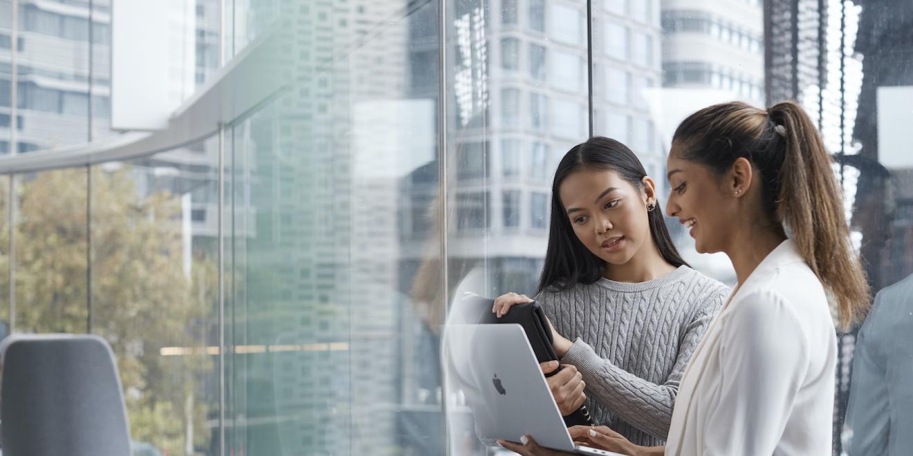 Two female students collaborating inside UTS modernised campus