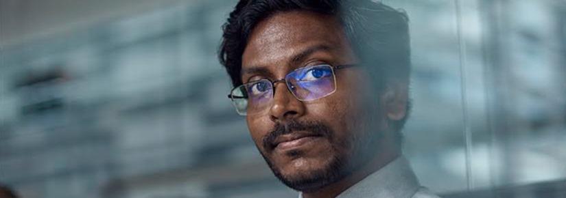 Close up of AAII's Dr Avinash Singh looking off into the distance