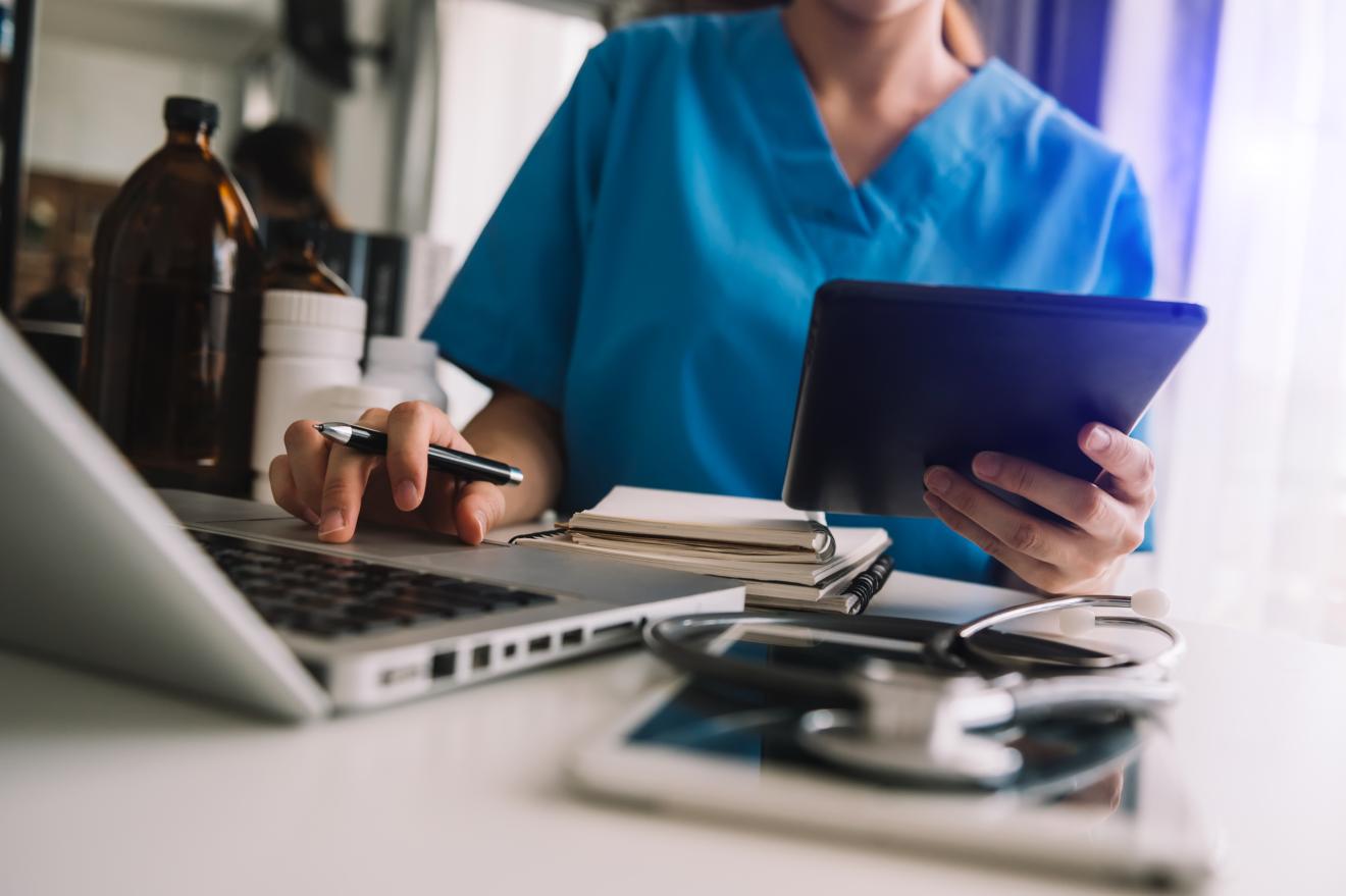 Doctor working on laptop