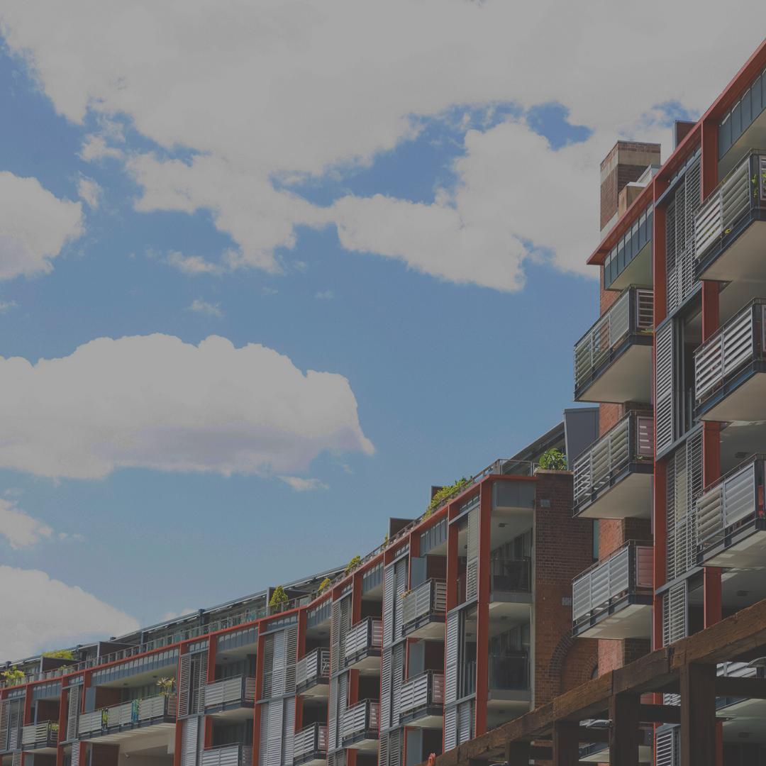 Apartment building against blue sky