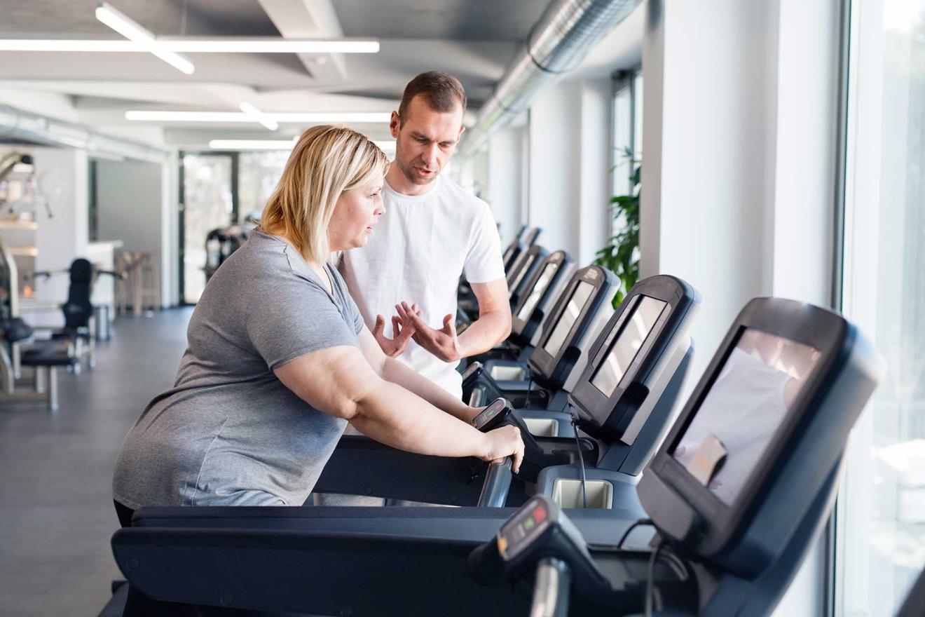 woman on treadmill in gym