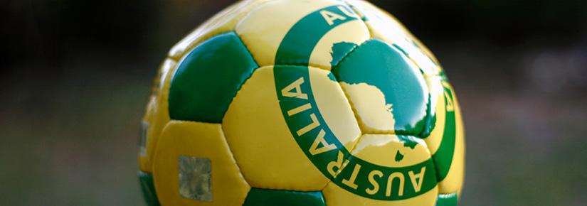 Yellow and green football showing map of Australia and the word Australia
