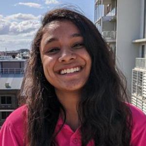 Picture of woman smiling on balcony in Sydney