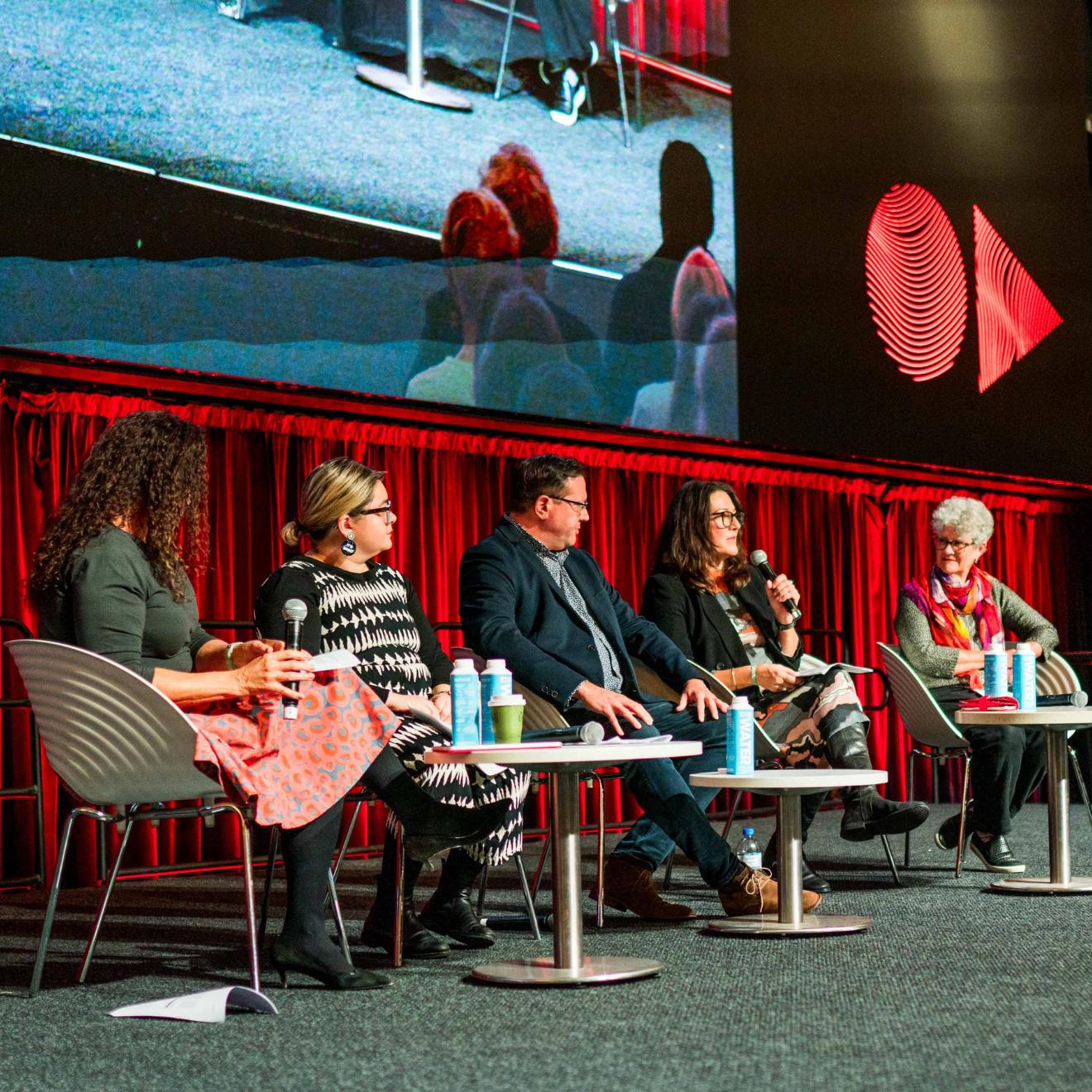 A panel on stage at Reconciliation week