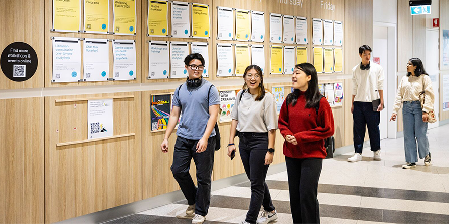 Students walking through the UTS Student Learning Hub