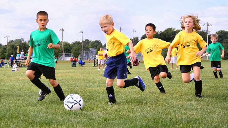 Children playing football