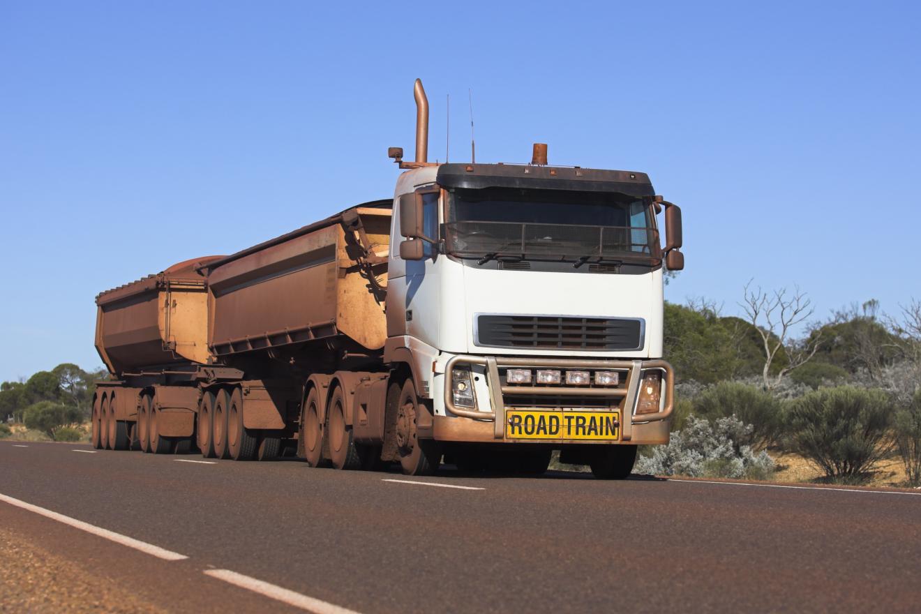 Mining truck driving along road