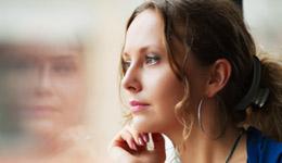 woman looking through the window