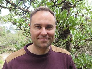 Portrait of Dr Brad Murray