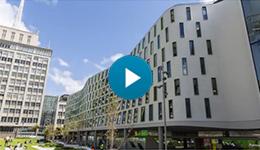 The curvy, colourful facade of the new Faculty of Science and Graduate School of Health Building overlooking Alumni Green