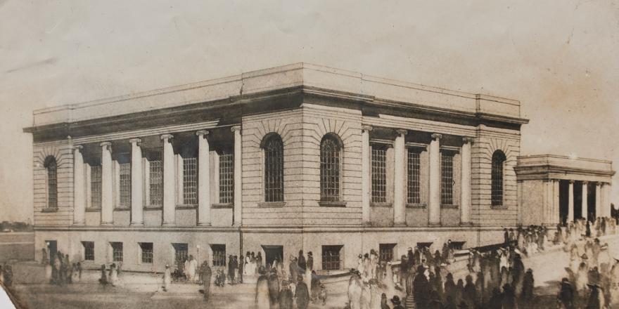 Old sepia toned photograph of building with horses and people in front of it. 