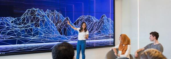 A female student presents to the class
