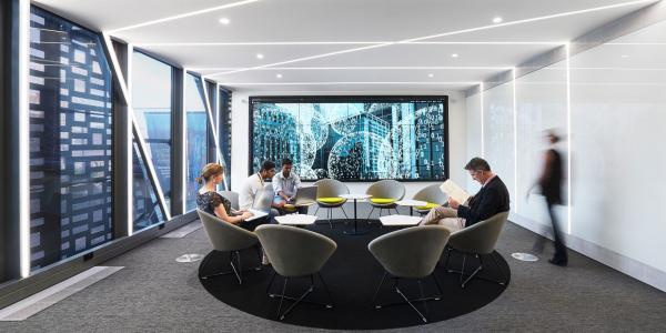 A group of people working in the UTS Data Lounge