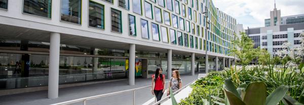 Two girls in front of the UTS science building