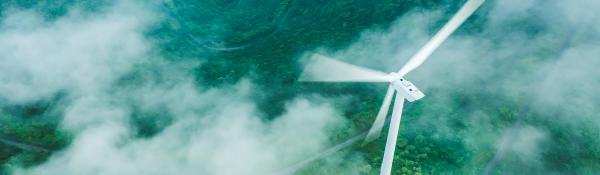 Misty view of wind turbine