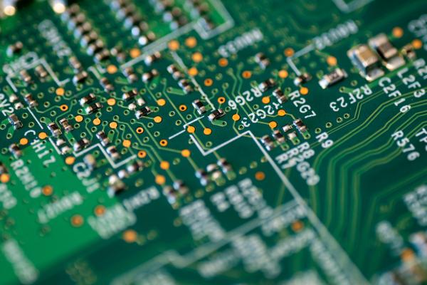 Close range view of a green and white circuit board