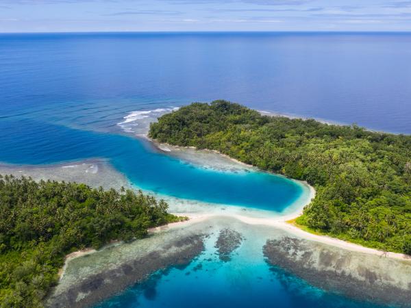 Aerial view of islands, reef and beach in Papua New Guinea