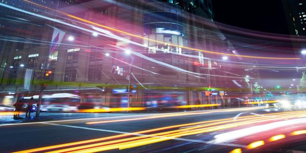 Cars going fast at night