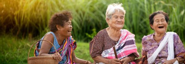 three older women laughing