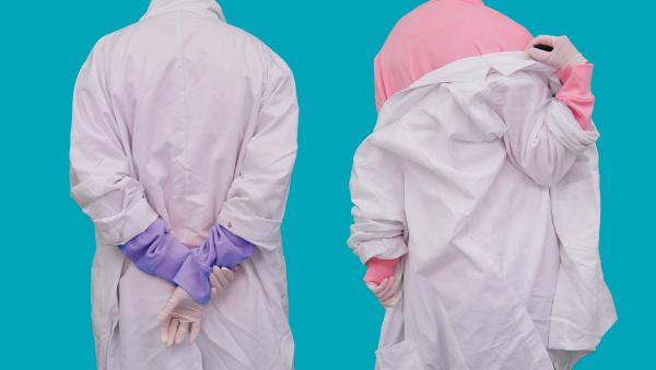 Two people in lab coats