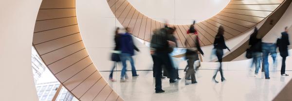 Crowd of UTS students walking around futuristic campus