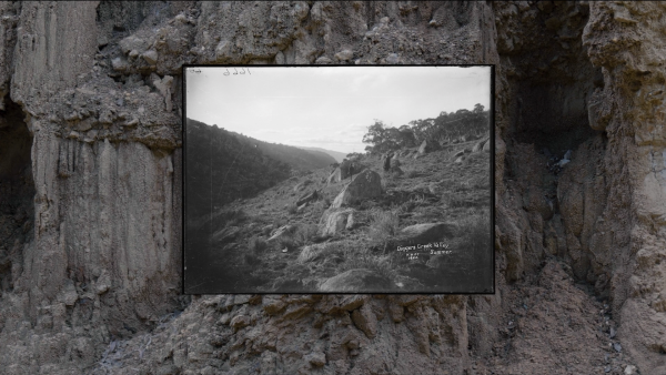 A digital image of a rocky landscape overlaying a digital image of a mining site.