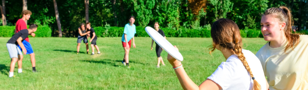 People playing ultimate frisbee.