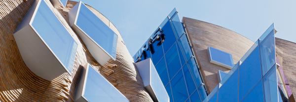 Looking up at UTS Business School building and sky