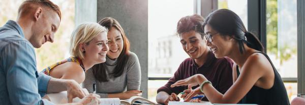 Students studying in college library