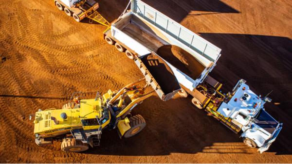 loading a semi trailer with iron ore