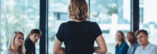 Female business leader conducting a meeting