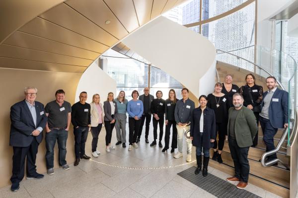 Group of Alumni ambassadors in the building 2 double helix staircase