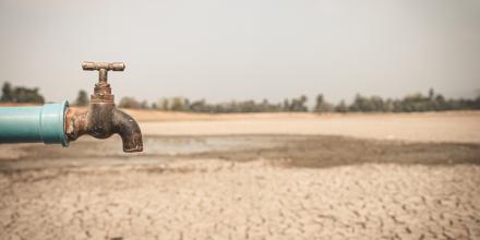 Tap with dry ground behind