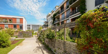 Modern residential buildings, new apartment houses with green outdoor facilities in the city