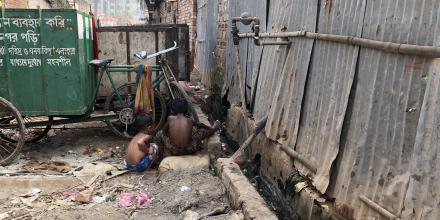 Two children playing in a polluted area