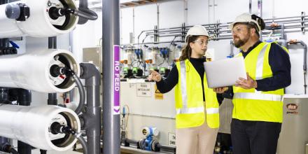 Alexandra Butler and Simon Fane at water recycling facility in Central Park buildings