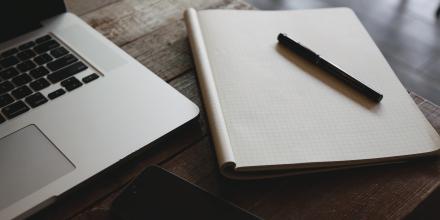note and laptop