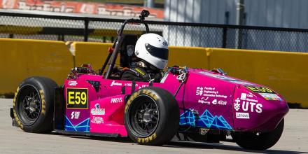 The UTS Motorsports vehicle in a time trial race
