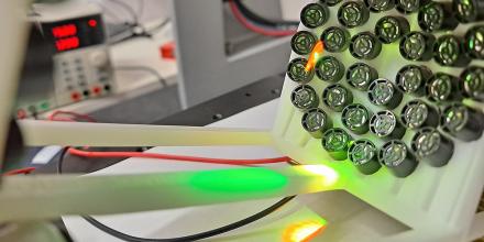 An array of ultrasound speakers levitating Bee's wing and leg
