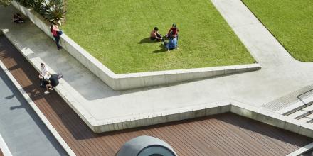 Aerial shot of UTS students sitting around Alumni Green