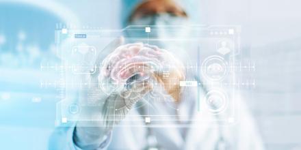 Doctor looking at virtual image of brain