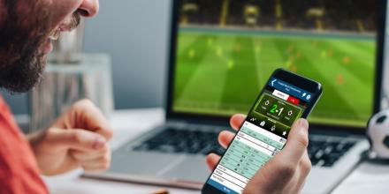 Photo of someone betting online