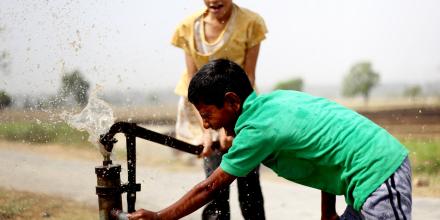 2 people and water pump