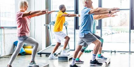 people in a step aerobics class